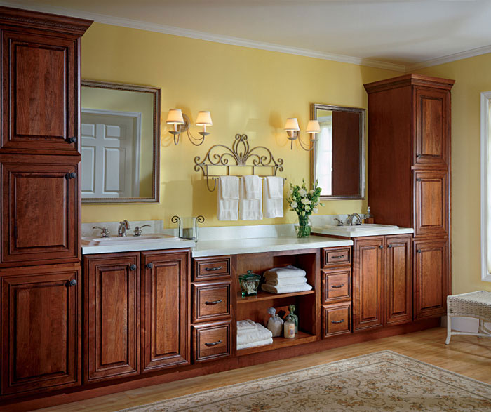 Cherry bathroom cabinets by Kemper Cabinetry