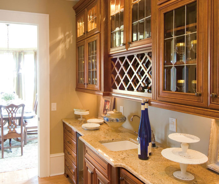 Cherry cabinets in a traditional kitchen by Kemper Cabinetry
