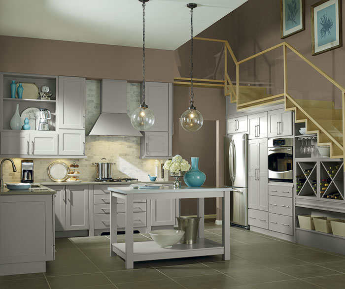 Light grey kitchen cabinets by Kemper Cabinetry
