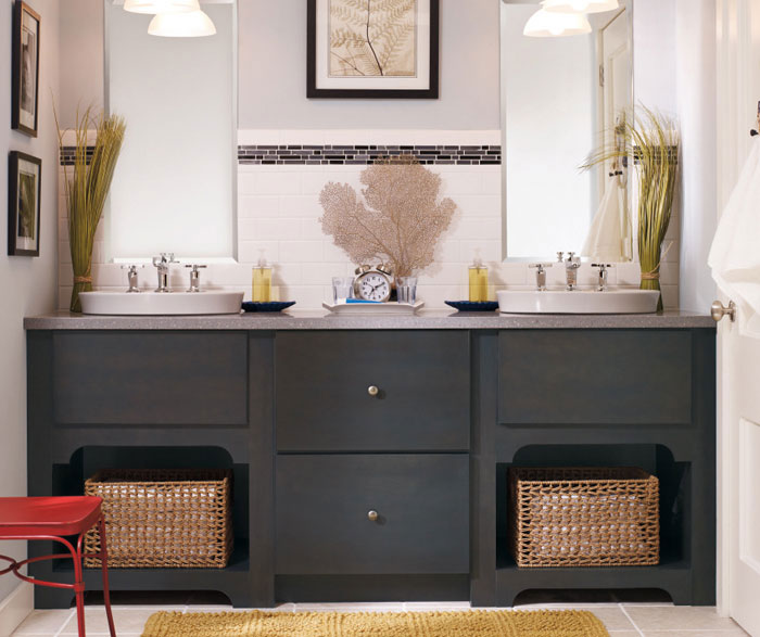 Dark gray bathroom vanity by Kemper Cabinetry